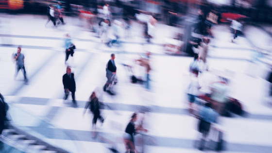 A lot of people walking on a mall