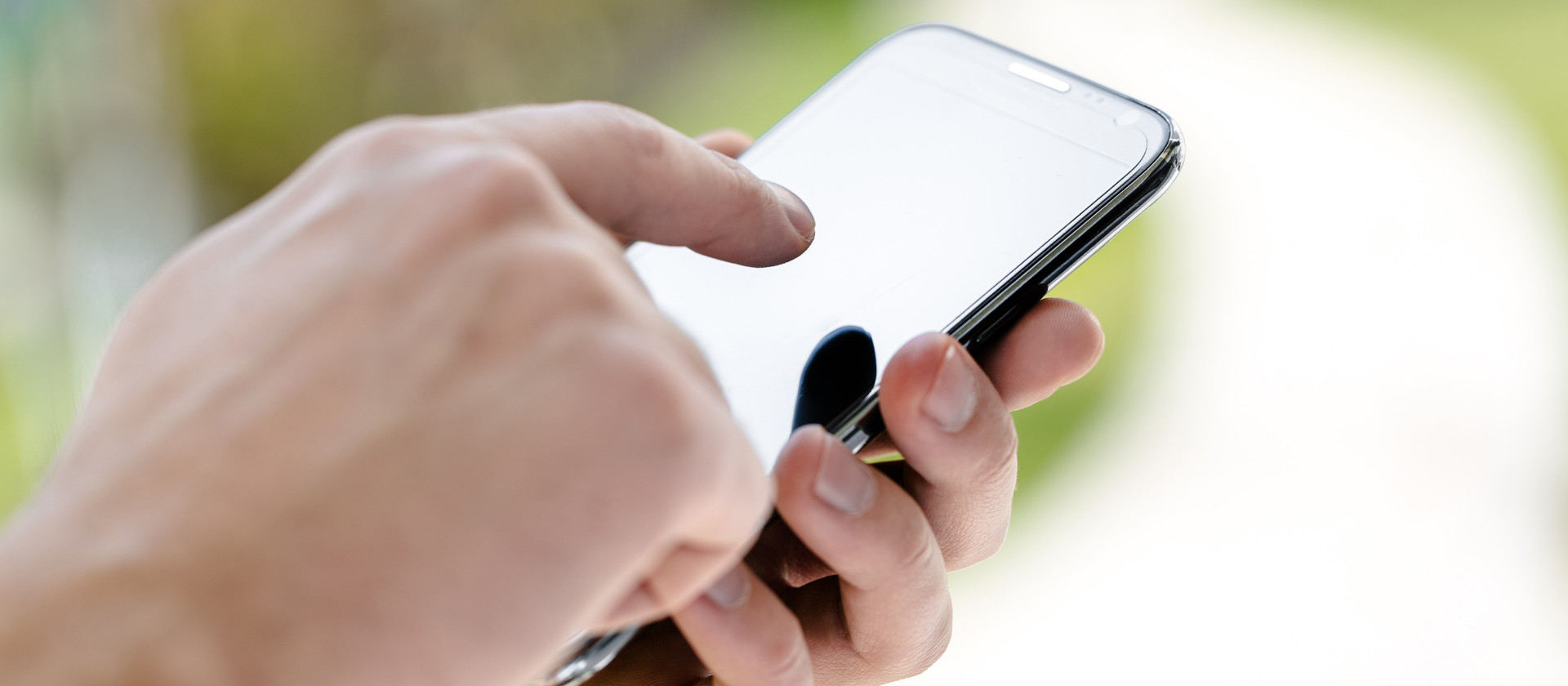 A man using his smartphone